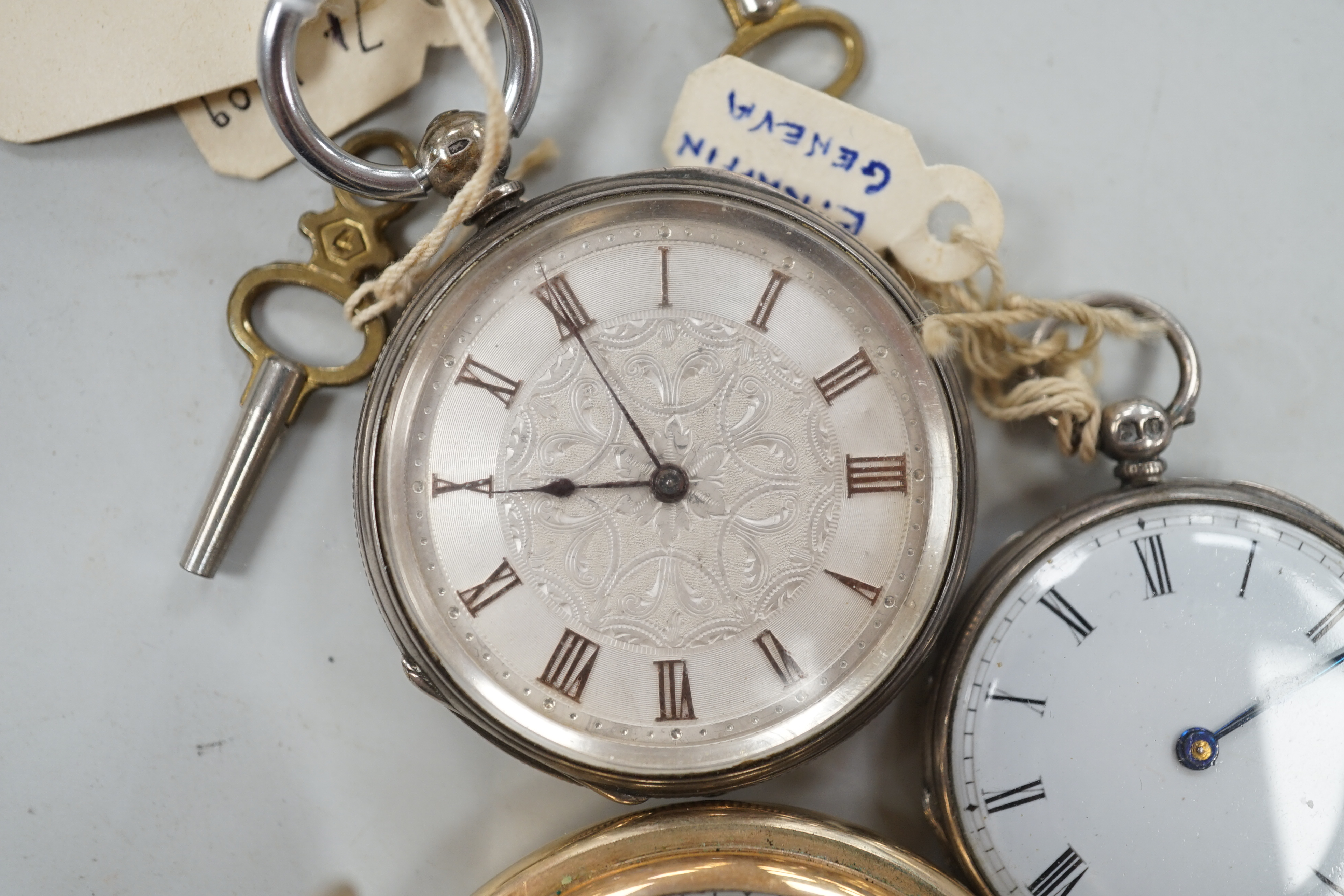 A Waltham gold plated hunter pocket watch and two fob watches, one silver.